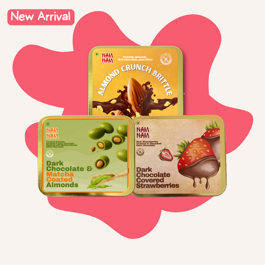 Three packages of NAN NAM chocolate products on a pink background